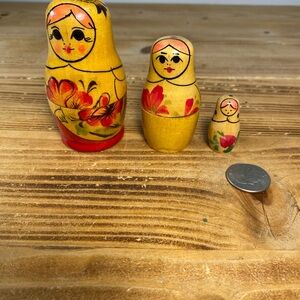 Set of Yellow Nesting Dolls with Floral Design